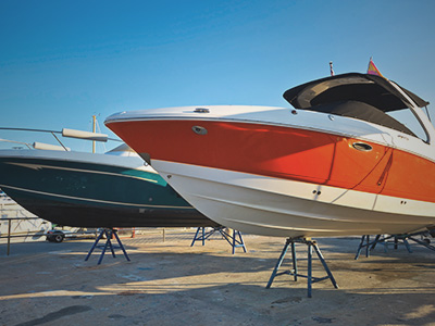 two boats on storage stands