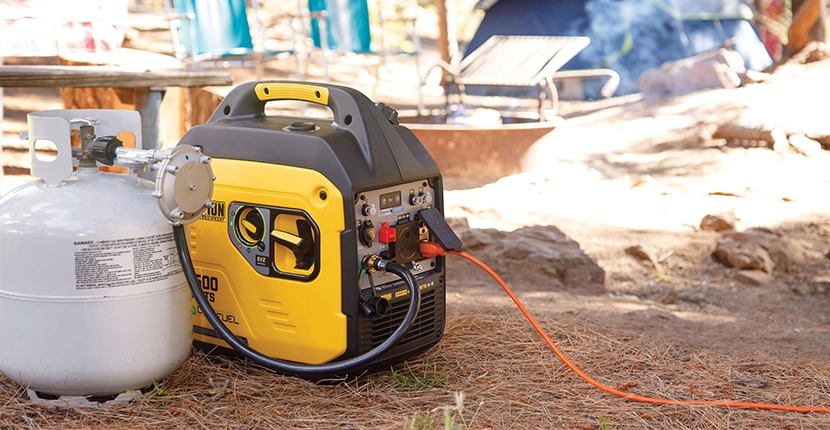 Champion Generator attached to propane at a campsite