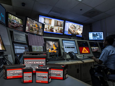 Contender branded batteries on a counter in a security room