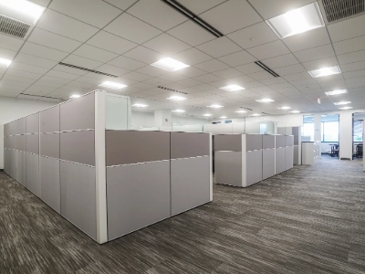 Inside an office building with cubicles