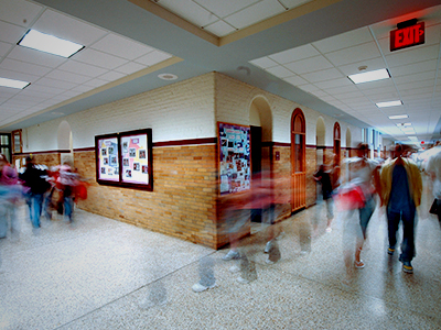 Students walking the halls of a school