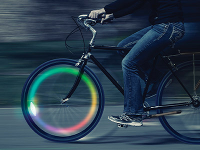 Riding a bike with lights in the wheel