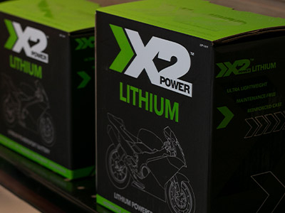 X2Power Lithium batteries on a shelf
